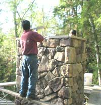 Finishing the masonry work on the chimney